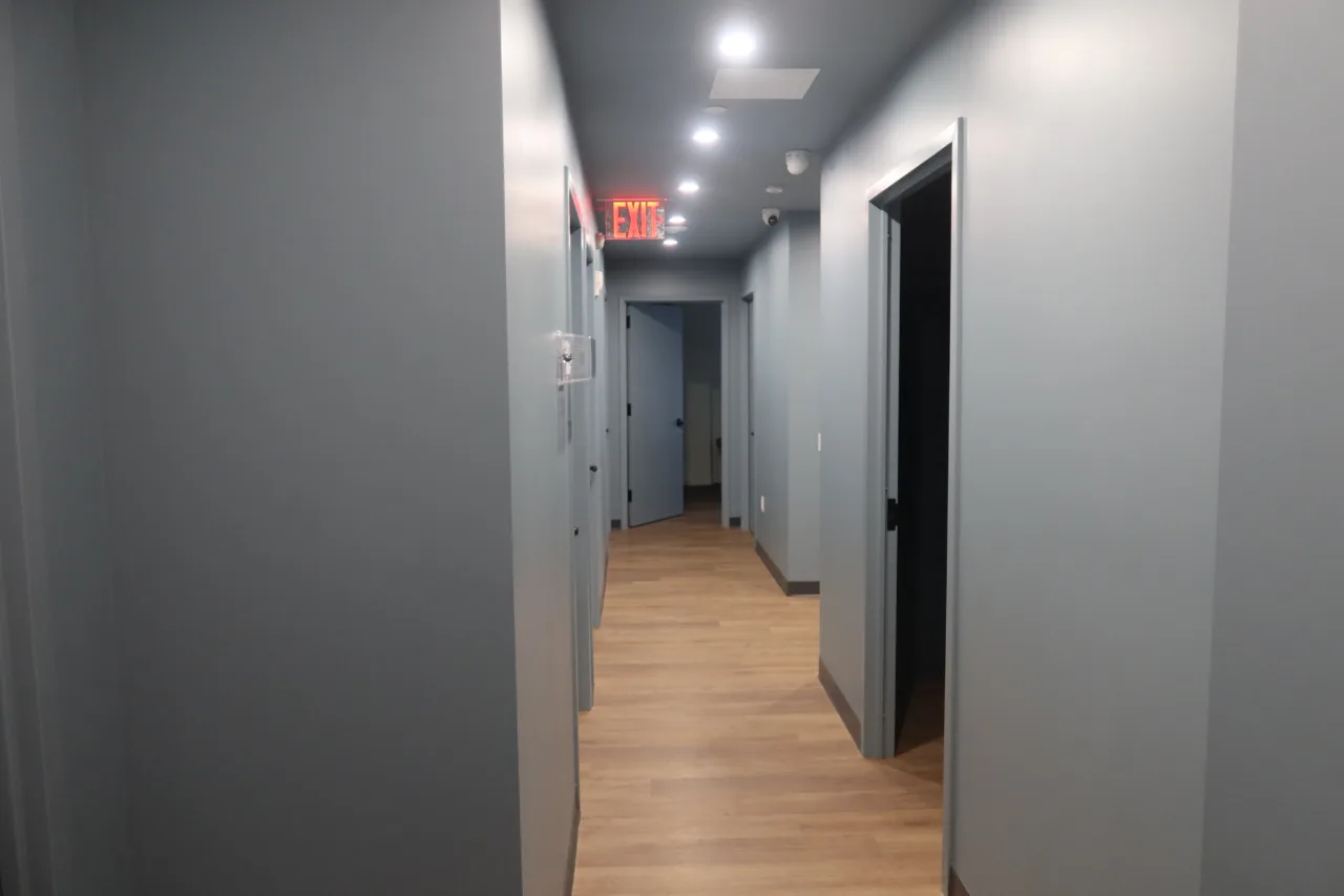 Corridor leading to the private treatment rooms